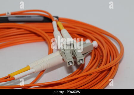 Fiber optics LC duplex connectors patch cord , isolated on white background Stock Photo