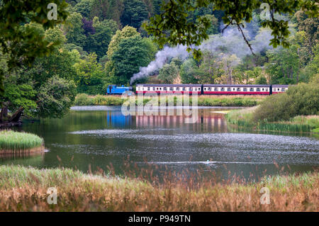 Lake district Lakeside steam train. river Leven Stock Photo