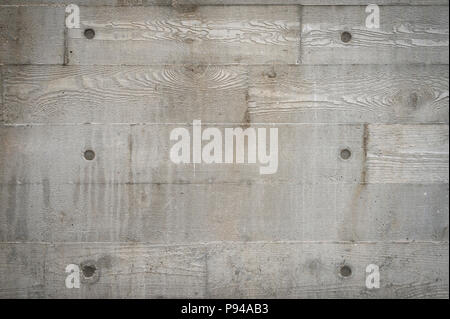 Abstract background of concrete wall showing marks of wooden formwork Stock Photo