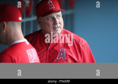 Los Angeles, CA, USA. 13th July, 2018. Los Angeles Angels manager Mike Scioscia (14) eyes the video monitor before the game between the Los Angeles Angels of Anaheim and the Los Angeles Dodgers, Dodger Stadium in Los Angeles, CA. Photographer: Peter Joneleit. Credit: csm/Alamy Live News Stock Photo