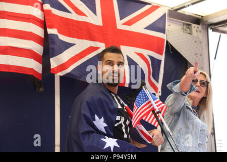 London, England. 14th July 2018. Pictured: Avi Yemini and Debbie Robinson. Despite police attempts to prevent the pro-Trump protest due to fears of violence from far-left counter protesters, supporters of Donald Trump assembled at midday outside the US Embassy in Vauxhall, London to welcome him on his visit to the UK. Credit: Richard Milnes/Alamy Live News Stock Photo