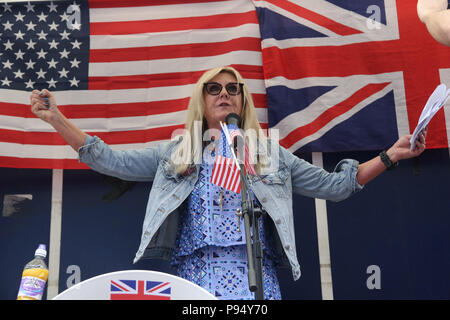 London, England. 14th July 2018. Pictured: Debbie Robinson (Australian Liberty Alliance). Despite police attempts to prevent the pro-Trump protest due to fears of violence from far-left counter protesters, supporters of Donald Trump assembled at midday outside the US Embassy in Vauxhall, London to welcome him on his visit to the UK. Credit: Richard Milnes/Alamy Live News Stock Photo