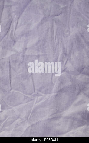 Violet wrinkled fabric texture. Closeup Stock Photo