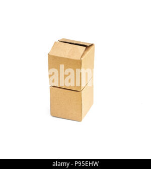 Two square cardboard boxes stand one on top of another on a white background Stock Photo