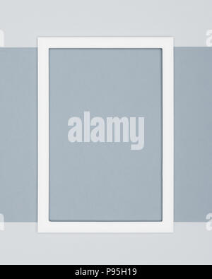 Abstract flat lay pale grey colored paper texture minimalism background. Minimal template with empty picture frame mock up. Stock Photo