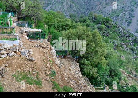 Howraman, Kurdistan Province, Iran - April 4, 2018: Cemetery in Howraman village or Uraman Takht at Zagros Mountain Stock Photo