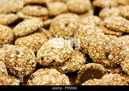 Sweet oatmeal cookies with cereals and raisins. Selective focus. Stock Photo