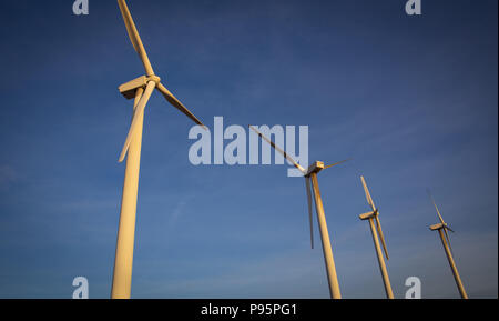 A Row of Wind Turbines Stock Photo