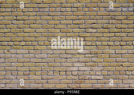 Rustic old white beige brick wall background in common bond pattern with grunge look Stock Photo