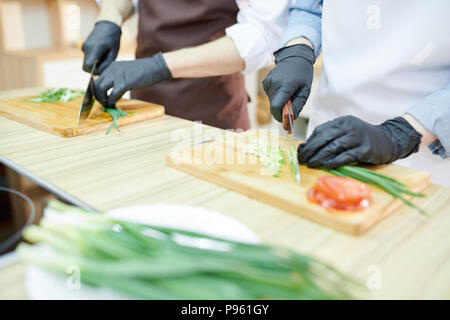 Two Chefs Cooking in Restaurant Stock Photo