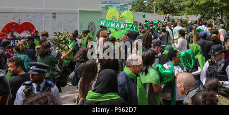 Members of family lay wreaths, flowers and lighting of candles at the base of Grenfell Tower outside Kensington Leisure Centre.  Featuring: Atmosphere, View Where: London, United Kingdom When: 14 Jun 2018 Credit: Dinendra Haria/WENN Stock Photo