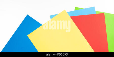 Colourful paper sheets on white background. Stock Photo