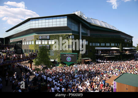 Novak Djokovic with the trophy on a centre court balcony after winning the Gentlemen's singles final on day thirteen of the Wimbledon Championships at the All England Lawn Tennis and Croquet Club, Wimbledon. Stock Photo