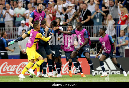 France players celebrate after France's Kylian Mbappe scores their side's fourth goal of the game during the FIFA World Cup Final at the Luzhniki Stadium, Moscow. Stock Photo