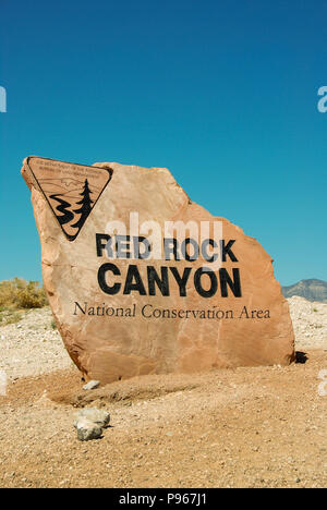 Sign on a large rock outside the entrance to the Red Rock Canyon National Conservation Area on the outskirts of Las Vegas, Nevada. Stock Photo