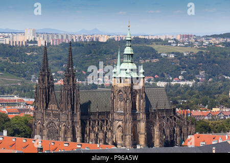 The Metropolitan Cathedral of Saints Vitus, Wenceslaus and Adalbert, Prague, Czech Republic, bright sun, blue sky. Stock Photo