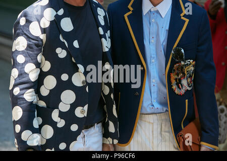 Hector Bellerin wears a Neil Barrett jacket, Zimmermann pyjamas and Gucci  shoes on the front row during the Bobby Abley London Fashion Week Men's  AW18 show, held at the BFC Show Space