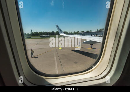 Looking through the window of a Ryan Air airplane Stock Photo