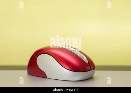 red and silver wireless mouse on a graphic tablet Stock Photo
