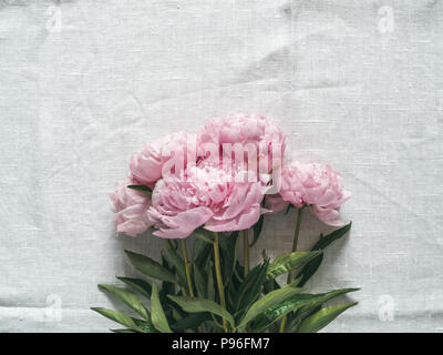 peony bouquet on white tablecloth Stock Photo