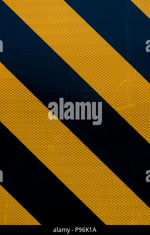 Yellow and black warning sign stripes Stock Photo