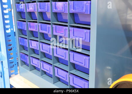 Plastic drawer for keeping parts in factory Stock Photo