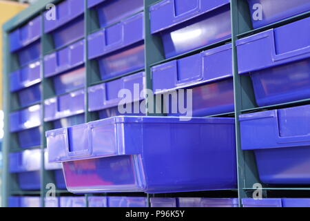 Plastic drawer for keeping parts in factory Stock Photo