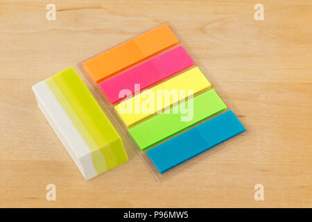 Color paper stickers and school writing instruments Stock Photo