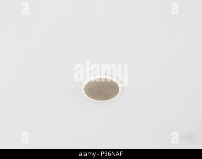 Modern loudspeaker is built-in the white ceiling with the copy space,in the business office. Stock Photo