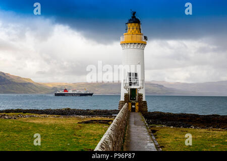 The Barra - Oban ferry passing Rubha nan Gall lighthouse on the Sound of Mull nr Tobermory, Mull, Argyll and Bute, Scotland, UK Stock Photo