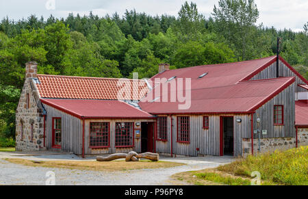 TRADITIONAL OLD WOOL MILL KNOCKANDO MORAY SCOTLAND THE RENOVATED WOODEN BUILDINGS OF THE MILL Stock Photo