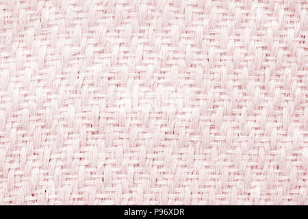 Red hand weaving matting tweed fabric texture. Closeup horizontal fragment Stock Photo