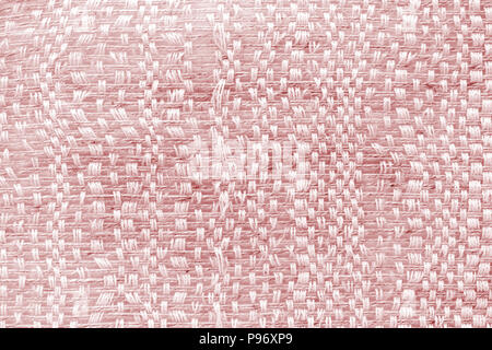 Red hand weaving matting tweed fabric texture. Closeup horizontal fragment Stock Photo