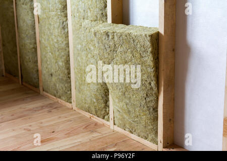 Rock wool and fiberglass insulation staff material for cold barrier. Tools  for work with glass wool: protective goggles, glasses and mask. Warm home  Stock Photo - Alamy