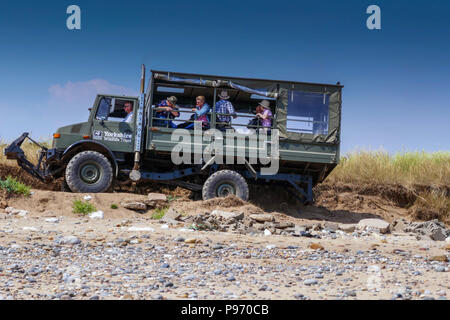 Unimog four wheel drive vehicle at Spurn Head, Spurn Point, sand spit, near Hull East Yorkshire, UK Stock Photo