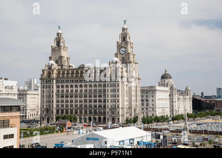 view of the Liver Building on Liverpool Pier head showing clock towers and surrounding environment Stock Photo