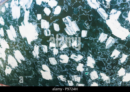 Texture of rusty colorful metal background with a peeling cracked layers of paint. Stock Photo
