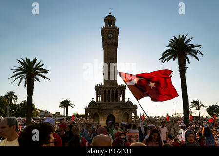 Izmir, Turkey - June 15, 2018: June 15 Day of Democracy in Turkey Izmir. Poeple holding Turkish flags at Konak square in Izmir and in front of the his Stock Photo