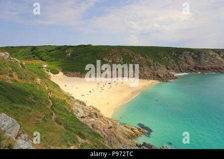 Holidaymakers at Porthcurno Bay and beach from the South West Coast Path, near Penzance, Cornwall, England, UK. Stock Photo