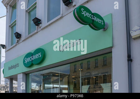 Front of Specsavers opticians shop on the corner of a town centre main street. Stock Photo