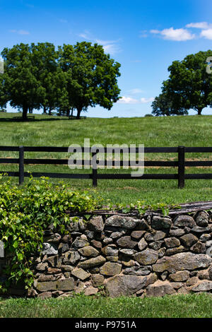 Beautiful stone wall and fence in the countryside near Upperville Virginia in Fauquier County Stock Photo