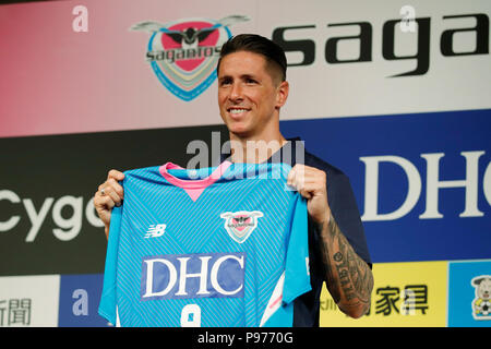 Tokyo, Japan. 15th July 2018. Tokyo, Japan. 15th July, 2018. Spanish  striker Fernando Torres shows his new No.9 jersey as he joins Japanese  professional football league J-League club team Sagan Tosu in