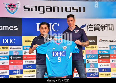 Tokyo, Japan. 15th July 2018. Tokyo, Japan. 15th July, 2018. Spanish  striker Fernando Torres shows his new No.9 jersey as he joins Japanese  professional football league J-League club team Sagan Tosu in