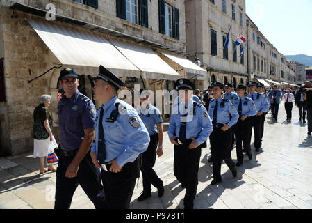 Dubrovnik, Croatia. 15th July, 2018. Chinese and Croatian police officers patrol after the launching ceremony of joint police patrol between China and Croatia in the Old Town of Dubrovnik, Croatia, on July 15, 2018. Six uniformed Chinese police officers started joint patrol with their Croatian counterparts here on Sunday. Credit: Gao Lei/Xinhua/Alamy Live News Stock Photo