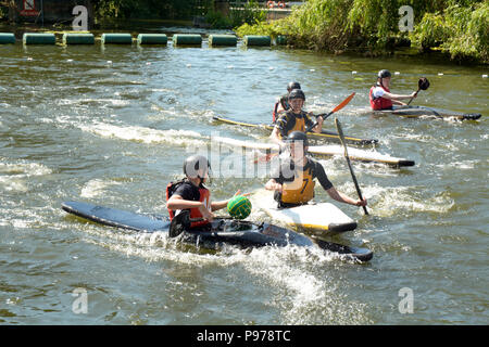 Bedford, England. 15 July 2018: Canoe water polo match between two teams on the River Ouse at the 40th River Festival in Bedford, Bedfordshire, England. Martin Parker/Alamy Live News Stock Photo