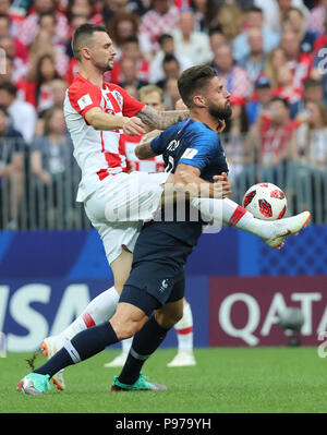 (180715) -- MOSCOW, July 15, 2018 (Xinhua) -- Olivier Giroud (R) of France competes during the 2018 FIFA World Cup final match between France and Croatia in Moscow, Russia, July 15, 2018. (Xinhua/Yang Lei) Stock Photo
