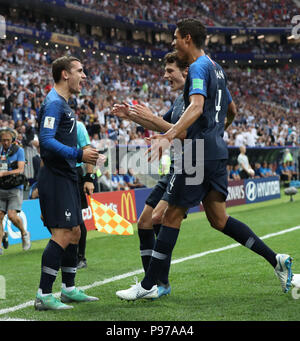 (180715) -- MOSCOW, July 15, 2018 (Xinhua) -- France's Antoine Griezmann (L) and Raphael Varane (R) celebrate after Croatia's Mario Mandzukic scored an own goal during the 2018 FIFA World Cup final match between France and Croatia in Moscow, Russia, July 15, 2018. (Xinhua/Cao Can) Stock Photo