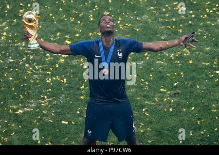 Moscow, Russia. 15th July 2018. Paul Pogba of France celebrates with the trophy after the 2018 FIFA World Cup Final match between France and Croatia at Luzhniki Stadium on July 15th 2018 in Moscow, Russia. (Photo by Daniel Chesterton/phcimages.com) Credit: PHC Images/Alamy Live News Stock Photo