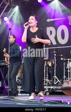 Caro Emerald performs at the 2018 Cornbury Festival, Great Tew, Oxfordshire, UK. 15th July 2018. Caroline Esmeralda van der Leeuw (born 26 April 1981) is a Dutch pop and jazz singer. She debuted under the stage name 'Caro Emerald' in July 2009 with 'Back It Up'. Follow-up single 'A Night Like This' reached #1 in the Netherlands. Emerald is often praised for her outstanding live performances. She predominantly performs in English mixed in with her own made up words in the form of scat singing as demonstrated in her hit 'Back It Up'. Credit: John Lambeth/Alamy Live News Stock Photo