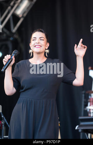 Caro Emerald performs at the 2018 Cornbury Festival, Great Tew, Oxfordshire, UK. 15th July 2018. Caroline Esmeralda van der Leeuw (born 26 April 1981) is a Dutch pop and jazz singer. She debuted under the stage name 'Caro Emerald' in July 2009 with 'Back It Up'. Follow-up single 'A Night Like This' reached #1 in the Netherlands. Emerald is often praised for her outstanding live performances. She predominantly performs in English mixed in with her own made up words in the form of scat singing as demonstrated in her hit 'Back It Up'. Credit: John Lambeth/Alamy Live News Stock Photo